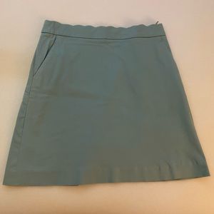 Mint-colored skirt w pockets.